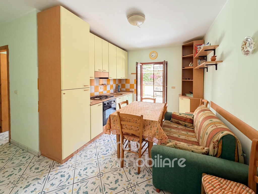 Trilocale con ampio terrazzo e garage